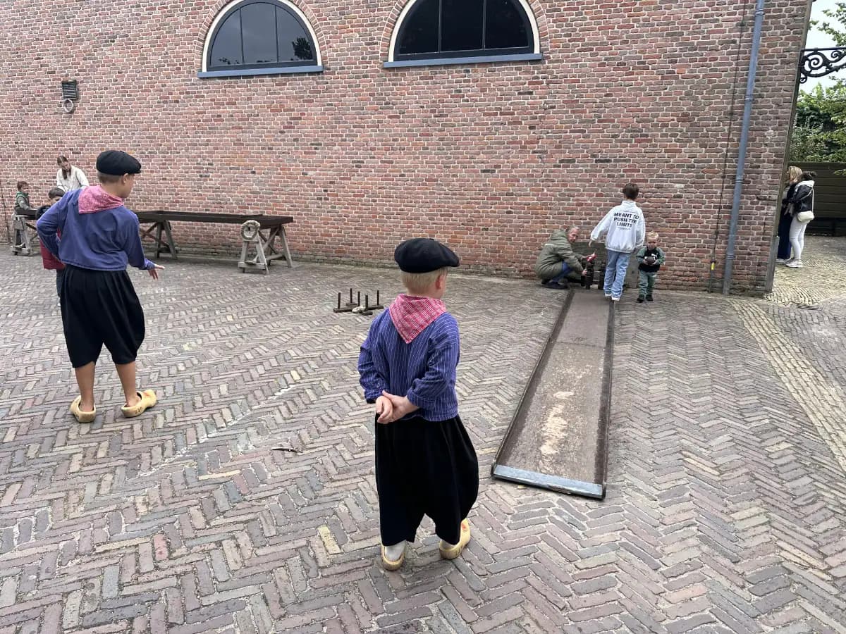 Children playing traditional Dutch games at the museum