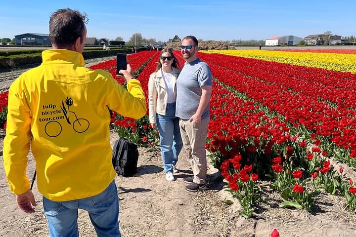 Support team assisting cyclists on tour
